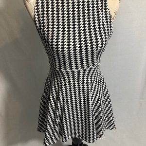 Sleeveless flirty houndstooth skater dress